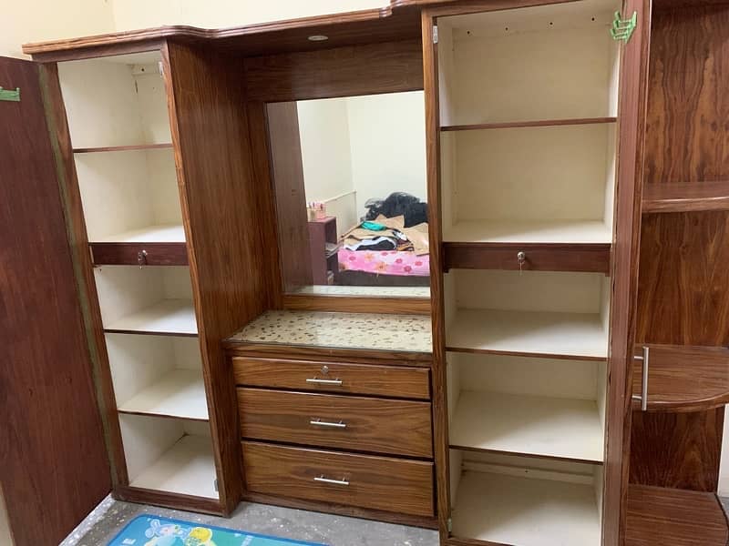 New wardrobe with dressing and book shelves with locker drawers 1