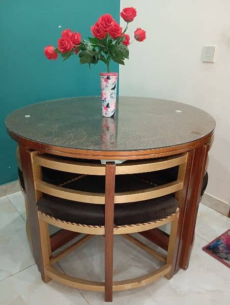 Wooden Round Dining with four chairs set for sale 1
