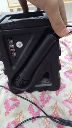 speakers high volume charger not available and two mics available