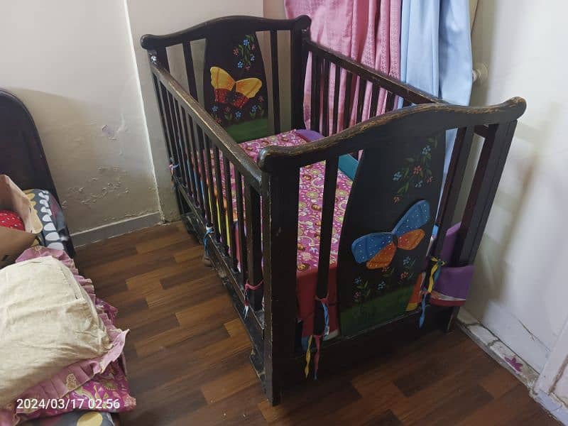 wooden baby / toddler cot bed available in used condition 0