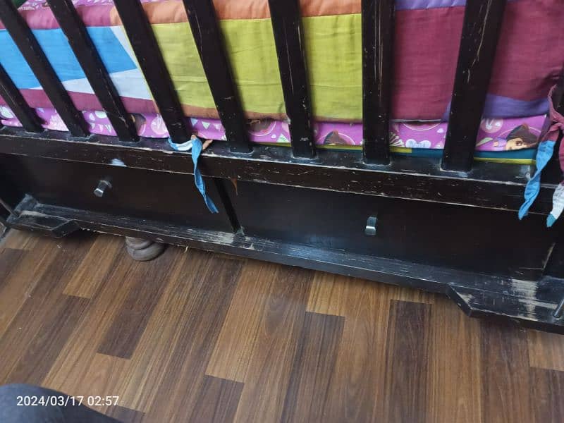 wooden baby / toddler cot bed available in used condition 1