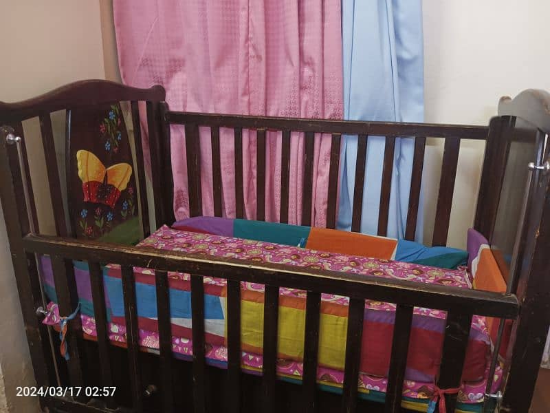 wooden baby / toddler cot bed available in used condition 4