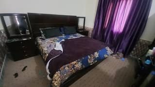double bed with side tables and dressing table 0