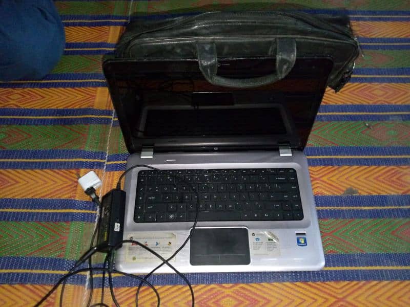 laptop boht lush condition hi all ok hi charger aur bag KY sath. 1
