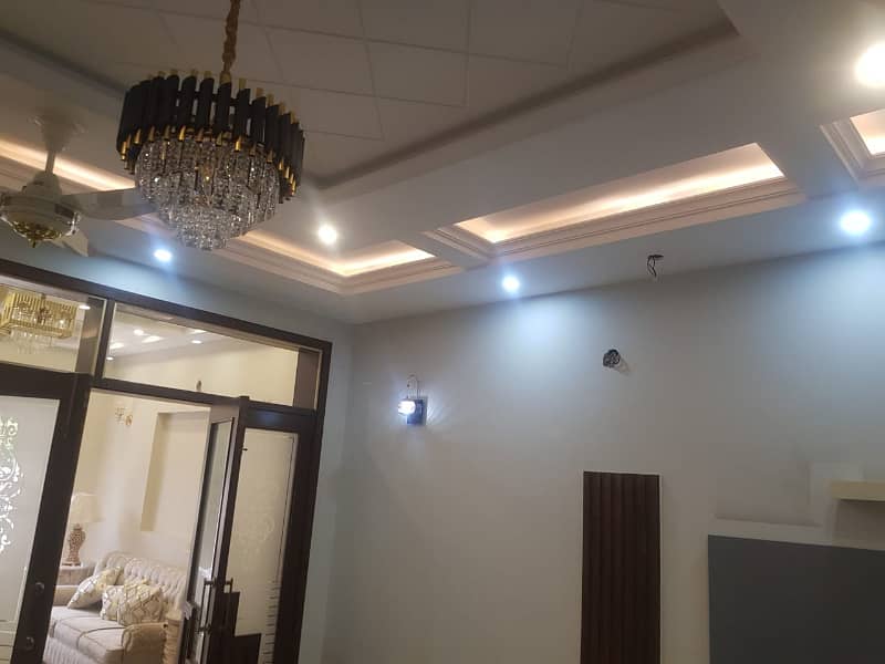 LOWER PORTION OF 10 MARLA LIKE A BRAND NEW GOOD EXCELLENT CONDITION HOUSE FOR RENT IN OVERSEAS A BLOCK BAHRIA TOWN LAHORE 5