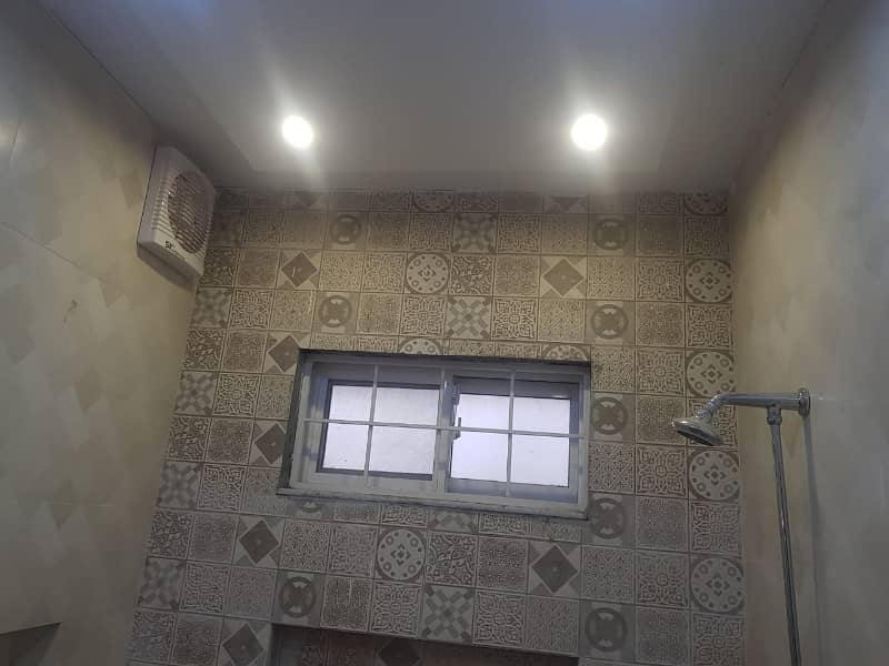 LOWER PORTION OF 10 MARLA LIKE A BRAND NEW GOOD EXCELLENT CONDITION HOUSE FOR RENT IN OVERSEAS A BLOCK BAHRIA TOWN LAHORE 13
