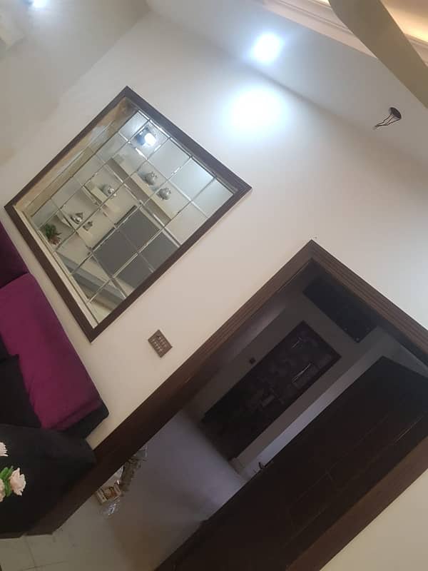 LOWER PORTION OF 10 MARLA LIKE A BRAND NEW GOOD EXCELLENT CONDITION HOUSE FOR RENT IN OVERSEAS A BLOCK BAHRIA TOWN LAHORE 27