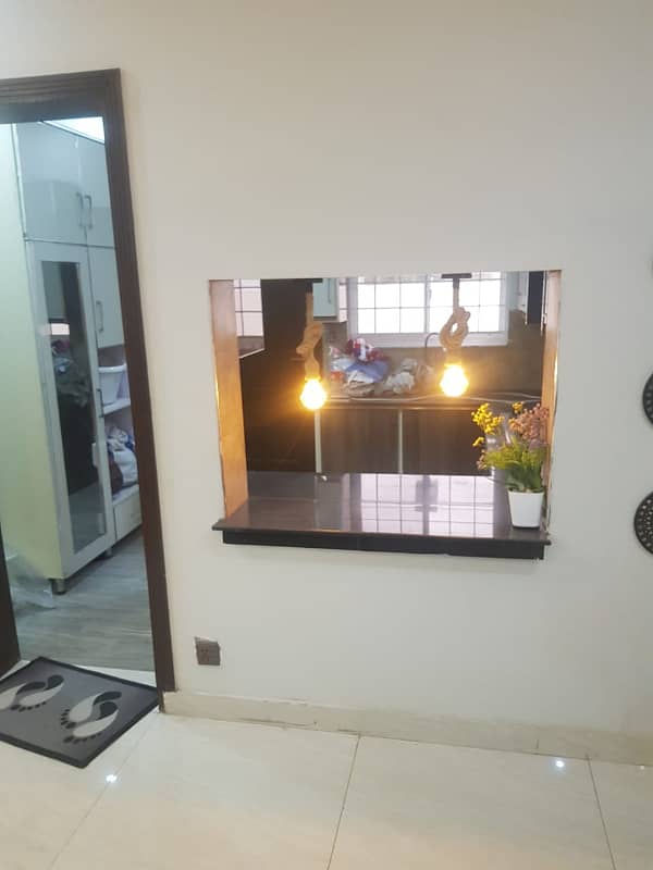 LOWER PORTION OF 10 MARLA LIKE A BRAND NEW GOOD EXCELLENT CONDITION HOUSE FOR RENT IN OVERSEAS A BLOCK BAHRIA TOWN LAHORE 31