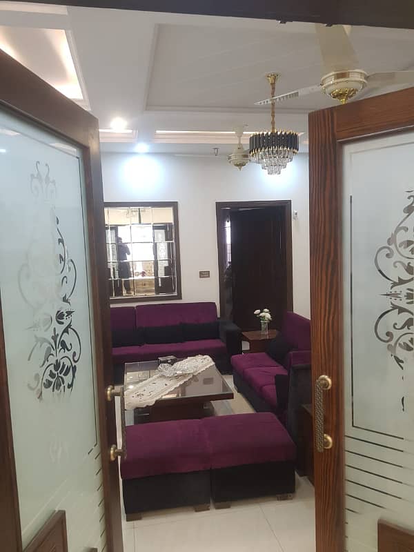 LOWER PORTION OF 10 MARLA LIKE A BRAND NEW GOOD EXCELLENT CONDITION HOUSE FOR RENT IN OVERSEAS A BLOCK BAHRIA TOWN LAHORE 34
