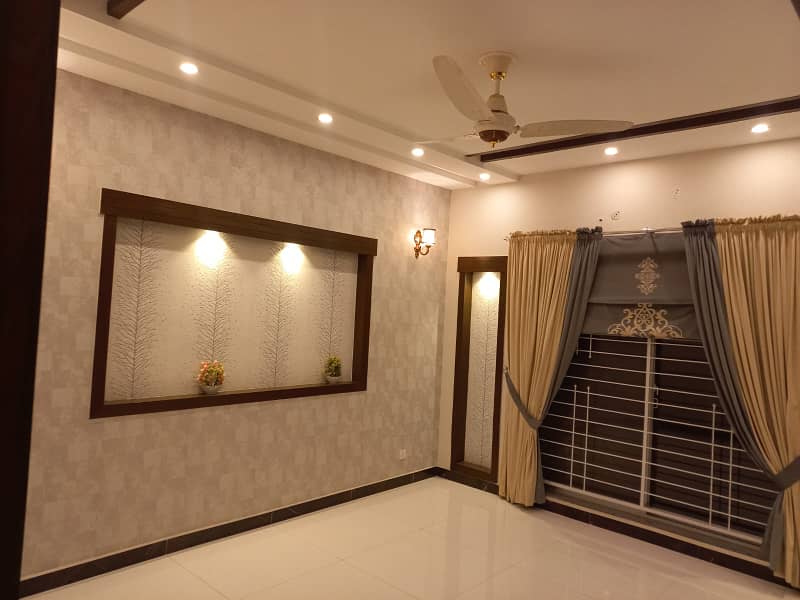 UPPER PORTION OF 10 MARLA BRAND NEW LUXURY CONDITION EXCELLENT GOOD FOR RENT IN AWAIS QARNI BLOCK BAHRIA TOWN LAHORE 14