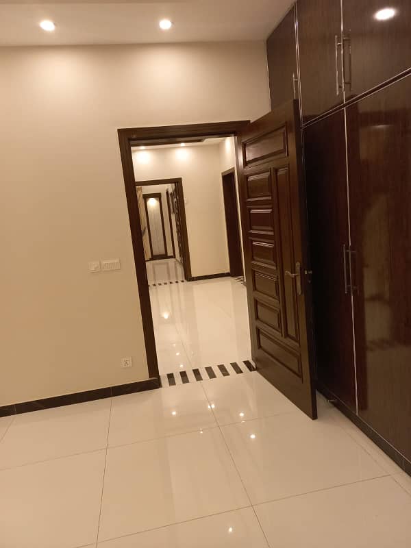 UPPER PORTION OF 10 MARLA BRAND NEW LUXURY CONDITION EXCELLENT GOOD FOR RENT IN AWAIS QARNI BLOCK BAHRIA TOWN LAHORE 21