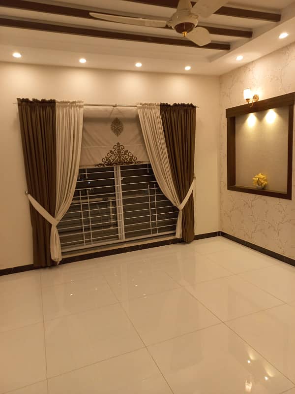 UPPER PORTION OF 10 MARLA BRAND NEW LUXURY CONDITION EXCELLENT GOOD FOR RENT IN AWAIS QARNI BLOCK BAHRIA TOWN LAHORE 28