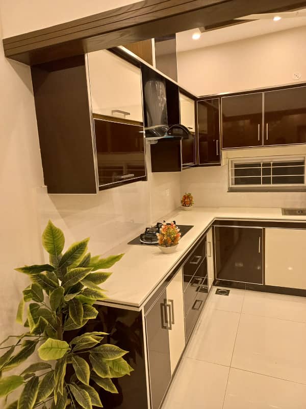 UPPER PORTION OF 10 MARLA BRAND NEW LUXURY CONDITION EXCELLENT GOOD FOR RENT IN AWAIS QARNI BLOCK BAHRIA TOWN LAHORE 32