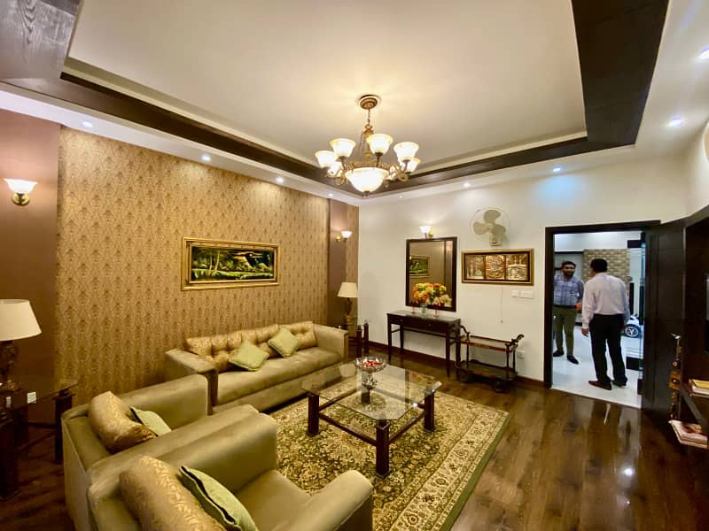 A Beautiful 1 Kanal 
Furnished 
Upper Portion Is Available For Rent In PHASE 4 DHA, Lahore 9