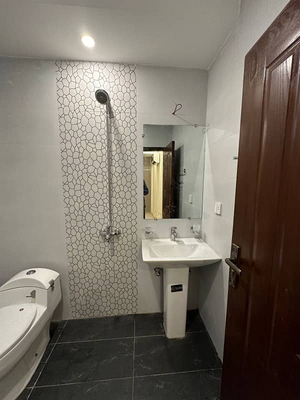 Tow badroom apartment available for rent daily basis in Bahria town 12