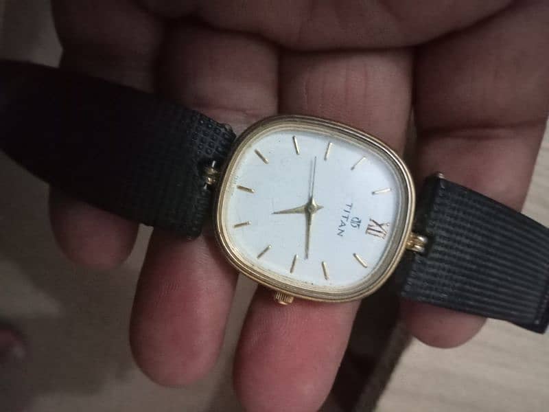 beautiful  Titan date time quartz watch Model whats app 03071138819 1