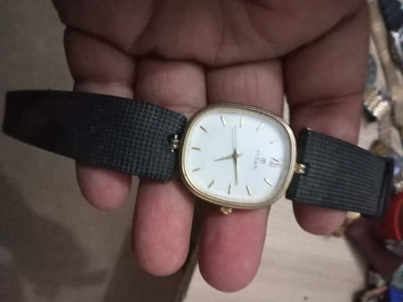 beautiful  Titan date time quartz watch Model whats app 03071138819 2