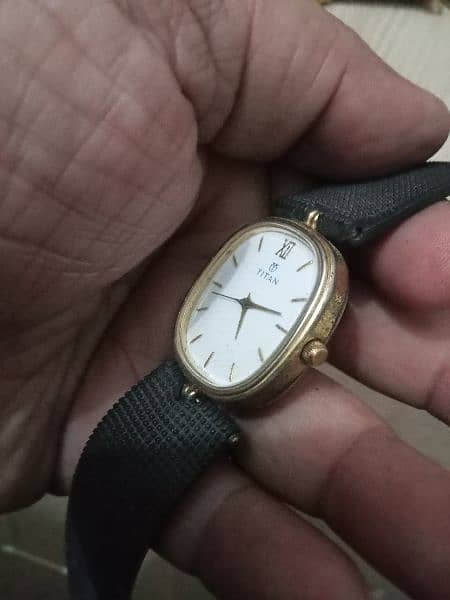 beautiful  Titan date time quartz watch Model whats app 03071138819 3