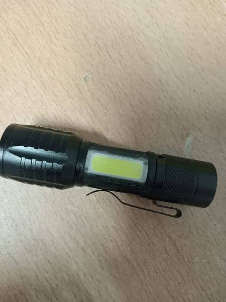 Rechargeable Mini Flashlight with Zoom and COB light 1