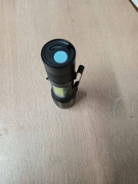 Rechargeable Mini Flashlight with Zoom and COB light 4