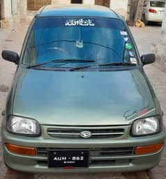 Daihatsu Cuore in lush conditions in Muzaffargarh City 0