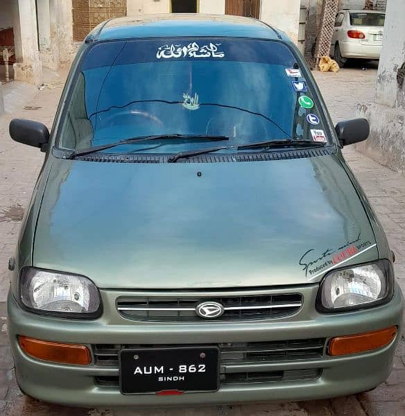 Daihatsu Cuore in lush conditions in Muzaffargarh City 9