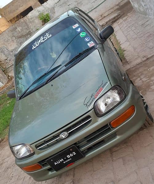 Daihatsu Cuore in lush conditions in Muzaffargarh City 11