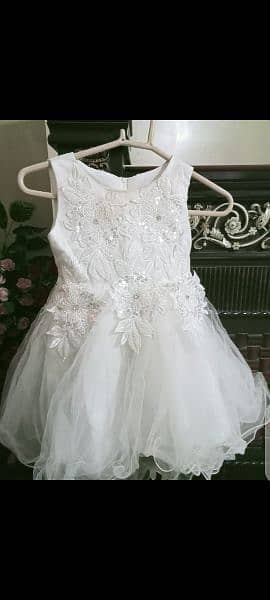 white tail frock in good condition 3