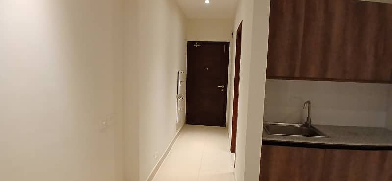 Studio Apartment Luxury Residential Brand New Available For Sale Near DHA Phase 4 10