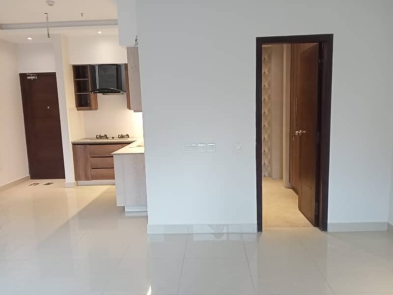 Luxury Residential Brand New studio Apartment Available For Sale Near DHA Phase 4 1