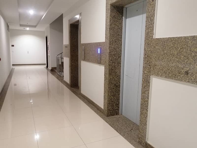 Luxury Residential Brand New studio Apartment Available For Sale Near DHA Phase 4 10
