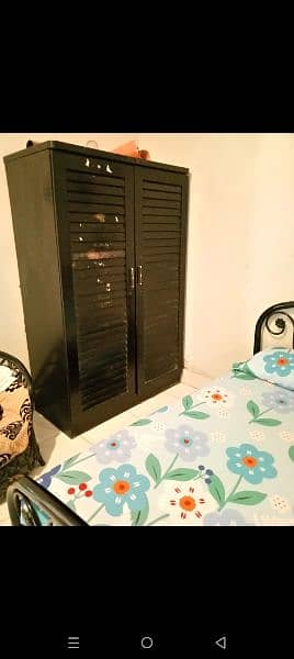 iron bed wooden cupboard 1