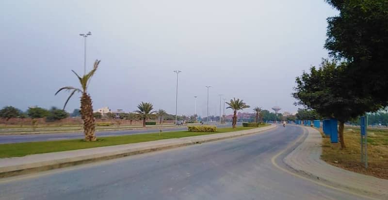 10 MARLA RESIDENTIAL PLOT FOR SALE POSSESSION UTILITY CHARGES PAID MB PAID LDA APPROVED IN G-6 BLOCK PHASE 4 BAHRIA ORCHARD LAHORE 11