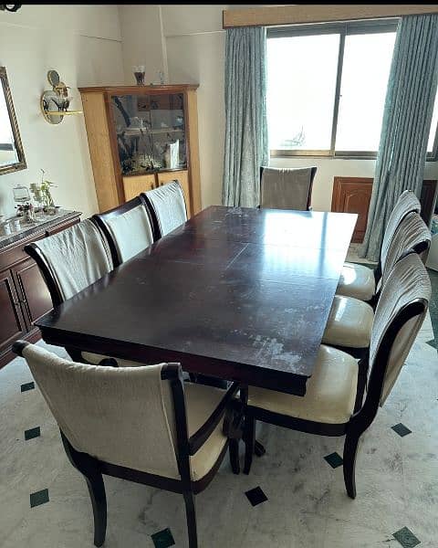 solid wood dining table with 8 chairs. 0