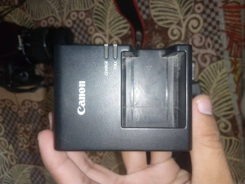 Canon 1200D Dslr Camera. 10.8 condition. 3 battery. battery grip . 3
