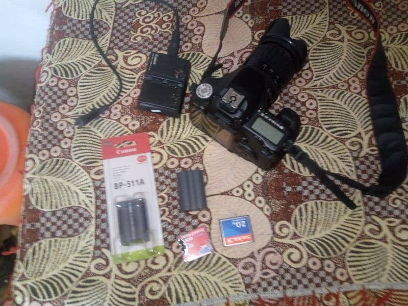 Canon 50D Camera 2 battery. CF card adaptor 3