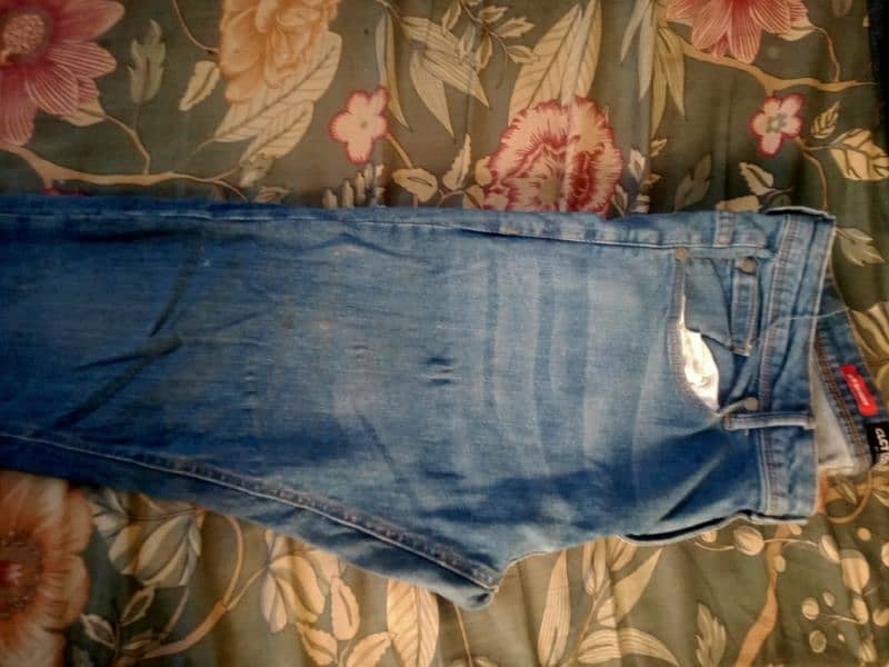 Slightly Used large size Male jeans and school pants 14