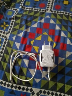 fast mobile charger with adapter and data cable.