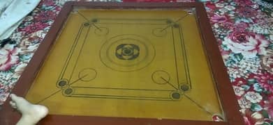 Big size carom board in good condition like new with dice urgent