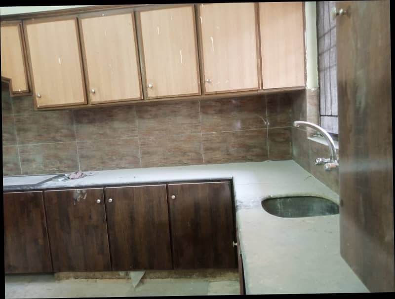1 Kanal Independent Upper Portion for Rent Lower Portion Locked with 2-Bed Rooms, TV Lounge Kitchen Store Garage 32