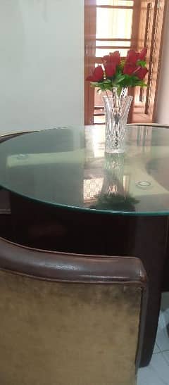 Circular Glass top dining table