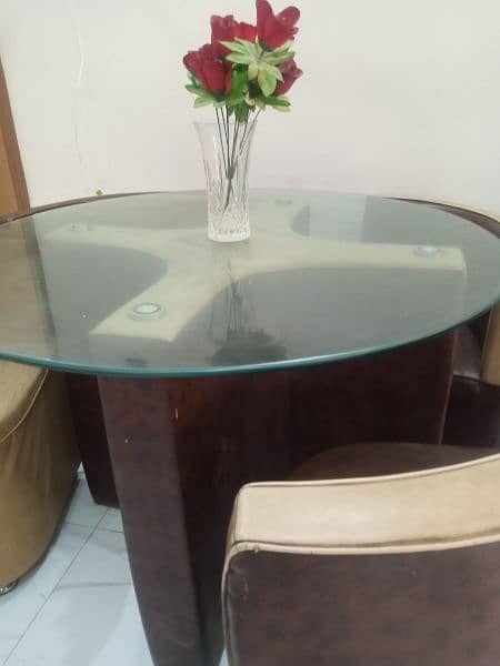 Circular Glass top dining table 2