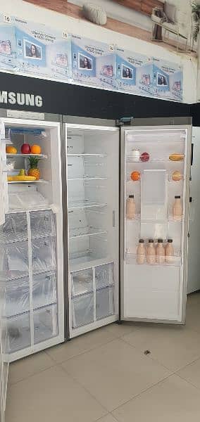 Samsung pair refrigerator and freezar silver and white available. 1
