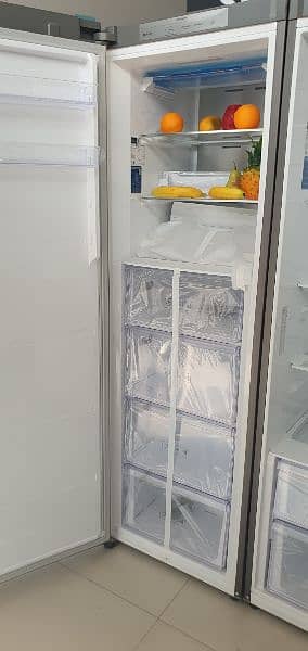 Samsung pair refrigerator and freezar silver and white available. 3
