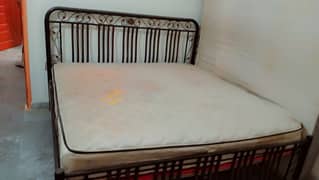 Iron bed with spring mattress