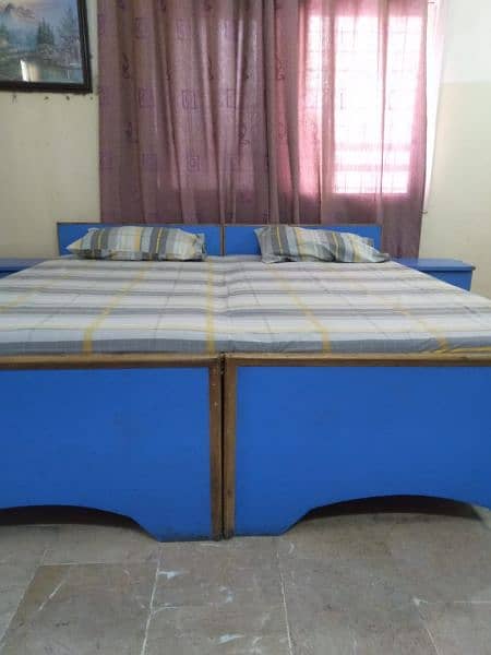 wooden bed set with side tables 0