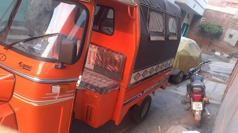 SAZGAR  12 Seater Rickshaw with Cargo Loader 1