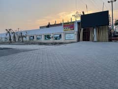 Very hot corner shop in Civic Avenue commercial market main Chiniot road facing, Jhumra City is available on very reasonable price. 0