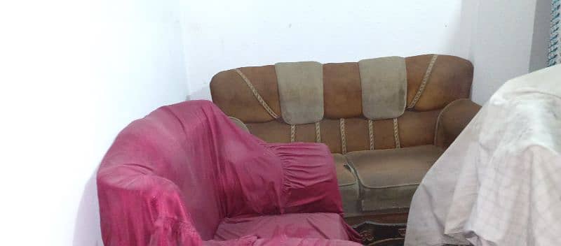 sofa set one one two wd cover condition used, looks perfect with cover 2
