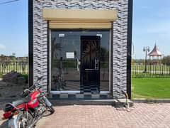 Newly built beautiful office in shop # 25 in Dream Valley, Main Shahkot road facing.